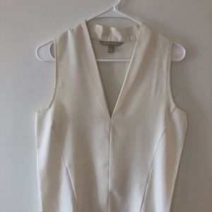 Cream-colored short-sleeved blouse